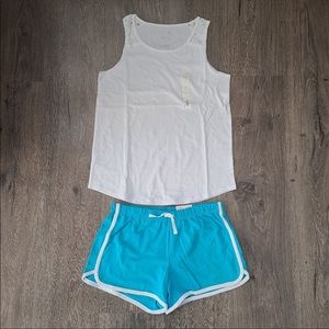 Tank top and shorts.